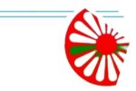 Logo z symbolem Czerwone koło – symbol wędrówki Romów – z zielonymi elementami oznaczającymi naturę